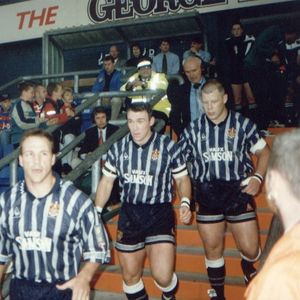 Matt Munro, David Bradbury and John Clarke take the field against Adelaide - July 25th 1997.