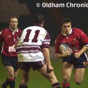 Dave Newton takes on the Manly defence - Nov 19th 2003.