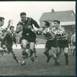 Terry O'Grady, Alan Davies and Ken Jackson move in on Kel O'Shea. Nov 7th 1956.