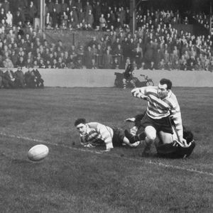 Derek Turner and Alan Davies watch the ball as (out of shot) Frank Pitchford runs in to score. Nov 7th 1956.