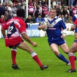 Bryan Henare & Paul Norton prepare to stop Steve Jackson - June 16th 2002.