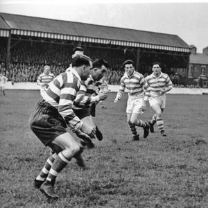 Bryn Goldswain and Dick Cracknell move in on Norman Field - Aug 21st 1954.