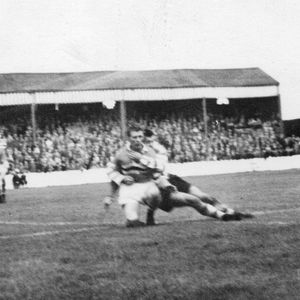 Cracknell moves in to tackle his opposite number against Blackpool - Sep 27th 1958.