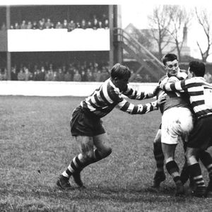 Des McKeown, Geoff Sims and Frank Pitchford tackle a Blackpool player Nov 14th 1959.