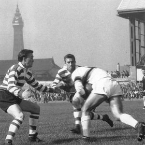 Geoff Sims and Brian Lord move in on a Blackpool opponent - Sep 16th 1963. Blackpool