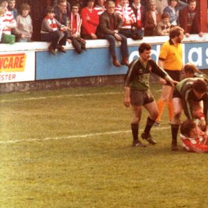 Alan Mc Currie moves in to the play ball from Gareth Owen - March 28th 1982.