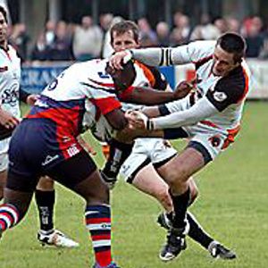 Blackpool's Damien Munroe struggles to halt an Oldham attack - June 22nd 2008