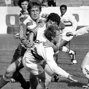 Alan Redfearn (Bradford) gets out a pass in a tackle by Ray Ashton and Mick Parrish - Aug 29th 1982.