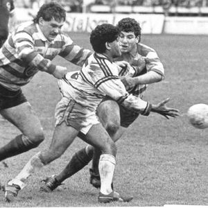 Mick Worrall and Ray Ashton make a tackle v Cas in the Cup semi-final - March 22nd 1986.