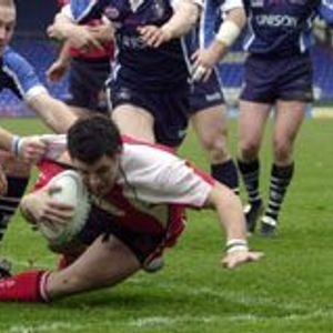 JAMES BUNYAN dives over the line for the first of his four tries in the high-scoring win over Featherstone Rovers - …