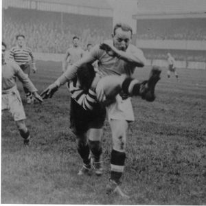 Action v Halifax with Tommy Hurtley, Joe Corsi and Evan Davies in the background - Sep 27th 1924.