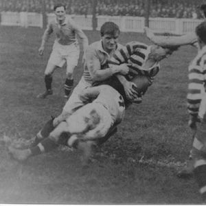Tommy Hurtley is tackled by Halifax defenders with George Hesketh in support - Sep 27th 1924.