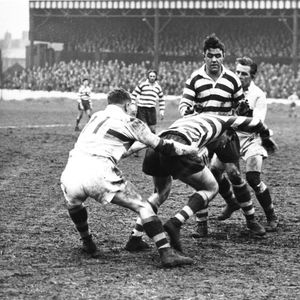 Fairbank tackles Roger Dufty as Ken Jackson looks on - April 7th 1958.