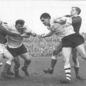 Charlie Bott drives it in as Len McIntyre and Geoff Robinson are occupied elsewhere April 15th 1964.