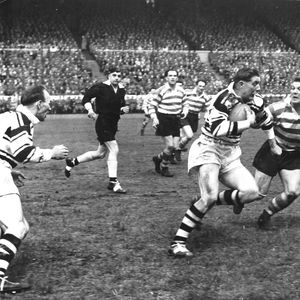 Don Vines moves in on Johnny Whiteley - May 18th 1957.
