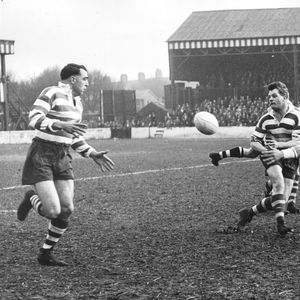 Ayres passes to Cracknell when challenged by Harrison - April 16th 1958.