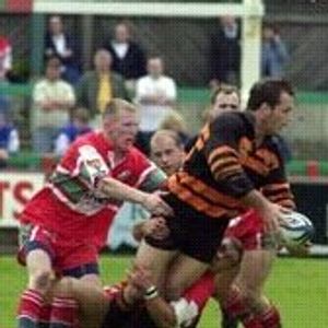 Steve Molloy looks to pass to David Gibbons - June 2nd 2002.