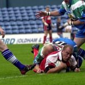 Dane Morgan forces his way over to score Oldham's second try v Keighley Aug 22nd 2004.