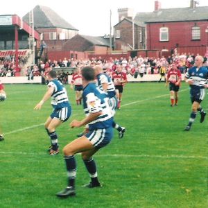 Steve Molloy releases a pass at Hurst Cross v Keighley - Sep 8th 2002.
