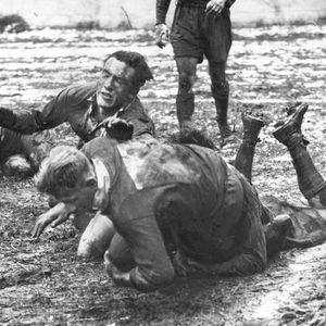 Walt Nicholson bring down Gordon Brown as Bert Cook look on - Feb 17th 1951.