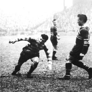 Harry Ogden finds himself surrounded by a trio of Leeds players at Headingley - Sep 10th 1955.