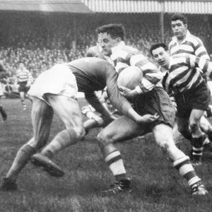 Sean Quinlan is tackled on his debut against Leeds as Ken Jackson and Frank Pitchford look on - Nov 22nd 1958.