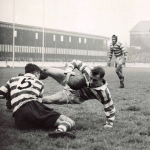 Bill Kindon is tackled by Terry O'Grady with Bryn Goldswain and Trevor Allan paying close attention - Oct 16th 1951.