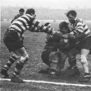 Peter Goddard, Des McKeown and Sid Little bring down Walt Tabern - Feb 14th 1959.