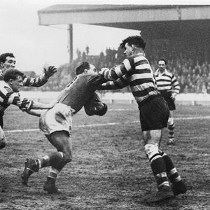 Stan Owen is brought to a halt by Ken Jackson, Des McKeown and Roger Dufty - Feb 14th 1959.