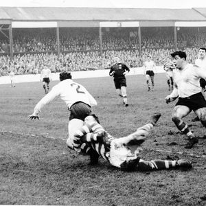 Lewis of Leigh brings down Brian Lord with Peter Smethurst and Malcolm Price in support - Feb 17th 1962..