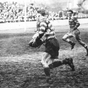 Head bandaged and shirt ripped, Ken Ward takes on Heitzman the Liverpool winger - March 3rd 1951.