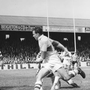 Joe Collins is well tackled v Liverpool on his debut - Sep 12th 1964.
