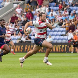 Ted Chapelhow breaks clear against London Broncos at Boundary Park. Sunday August 16, 2026.