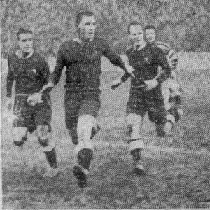 Joe Corsi races away from three of the Kiwis on the way to score the first Oldham try of the match - Oct 23rd 1926.