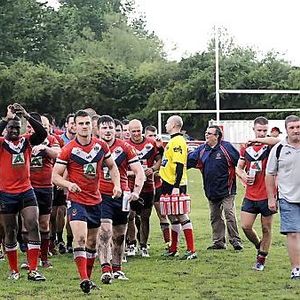 The team celebrate on the pitch at Whitebank - July 28th 2013.
