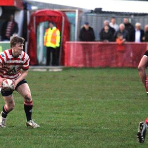 Gareth Owen looks to release a pass v North Wales - April 8th 2015.