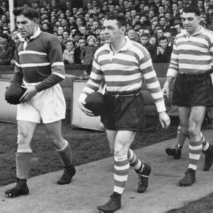 The crowd waits in anticipation as Bernard Ganley calmly leads out the team followed by Dick Cracknell and Dennis Ayres …