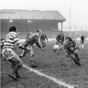 Kevin Taylor releases a pass to Mike Elliott at the Athletic Grounds - Feb 23rd 1975.