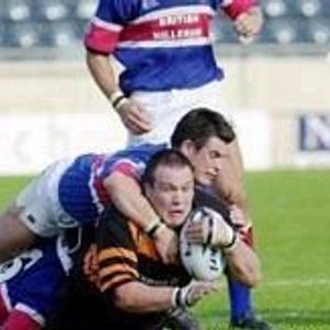 Danny Guest goes down in a two man tackle v Rochdale - Sep 22nd 2002.