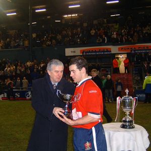 Ian Watson receives the Oldham Rugby League Heritage Trust Trophy from Brian Walker - Jan 18th 2004..