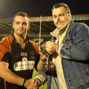 Tim Hughes presents the Heritage Trust Trophy to Andy Isherwood at Spotland - Jan 9th 2005.