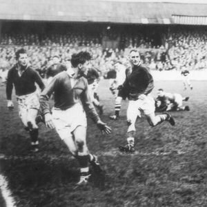 Frank Heyes takes on the Salford defence after a pass from Arthur Tomlinson - Oct 7th 1950.