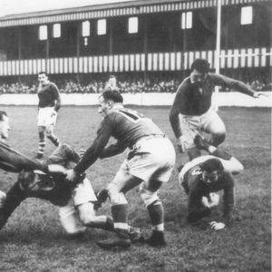 Arthur Tomlinson is tackled by Dai Moses and Jim Grainger - Oct 7th 1950.