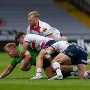Tom Forber, Matty Wildie and Owen Farnworth tackle an Eagles attacker. Sunday August 9, 2026.