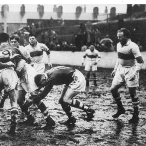 Harry Ogden, Jack Keith and Arthur Tomlinson about to bring down a St Helens player, as Alan Prescott (far right) looks …