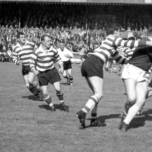 John Donovan makes a tackle watched by Harry Major, Jack Pycroft and Vince Nestor (hidden) - Aug 29th 1964.