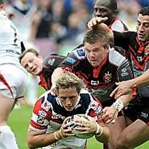 Oldham duo Adam Robinson and Said Tamghart cant prevent Oliver Wilkes from scoring a try for Wakefield - June 1st 2008.