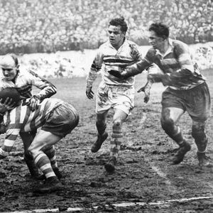 Brian Bevan is bundled into touch by Terry O’Grady with Ted White and Sid Little in attendance - March 6th 1954.
