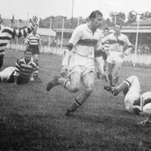 The ball goes loose as Jack Keith and Des McKeown (left) try to regather - March 15th 1958.