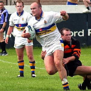 Neil Roden tackles Howard Hill. Whitehaven v Oldham - July 21st 2002.